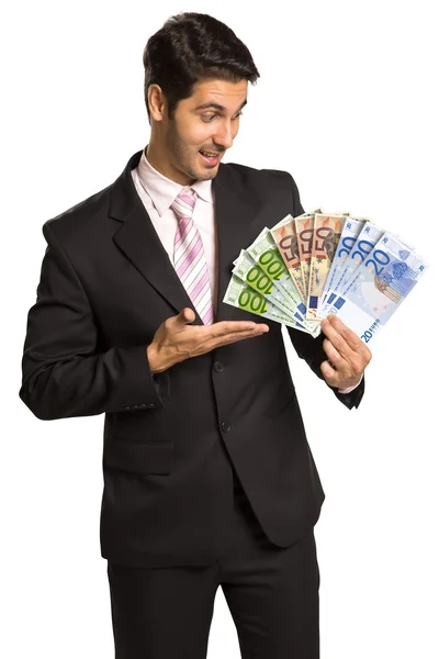 ビジネスの男性がお金を入れる/ユーロ — ストック写真