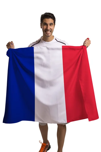 Fã segurando a bandeira da França celebra no fundo branco — Fotografia de Stock