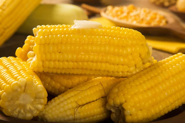 Close view on Homemade golden corn cob with butter and salt on t — Stock Photo, Image