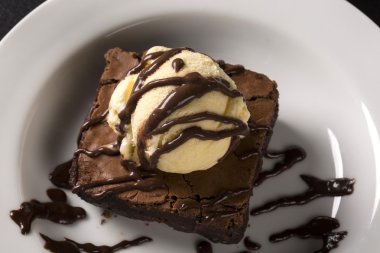 Chocolate Brownie with Vanilla Ice Cream. clipart