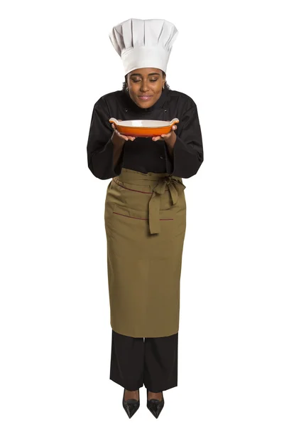 Chef showing empty plate. Woman cook or chef serving empty plate — Stock Photo, Image