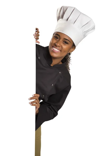 Happy woman cook or baker holding over paper sign billboard — Stock Photo, Image