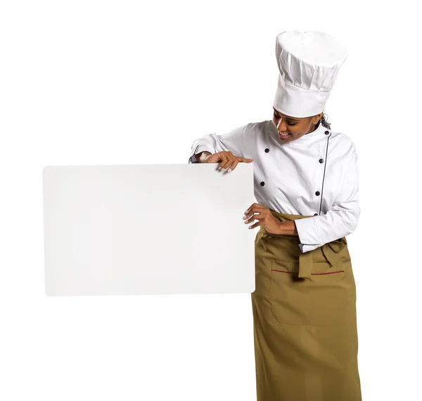 Chefe. Mulher cozinheiro mostrando menu vazio quadro com espaço de cópia . — Fotografia de Stock