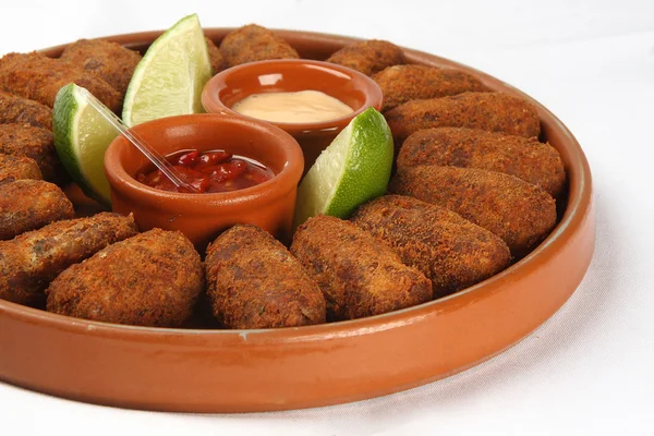 Pedaços de bacalhau salgado, bunuelos de bacalao — Fotografia de Stock