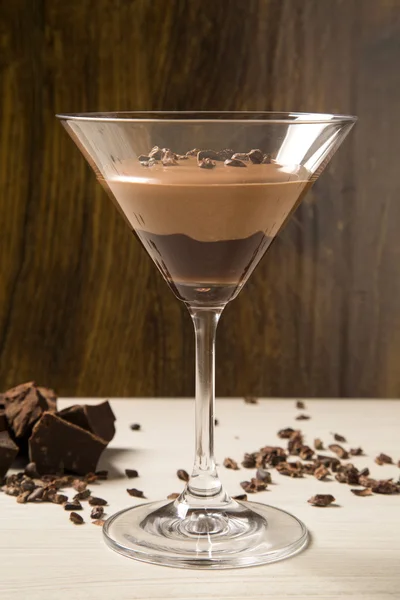 Chocolate mousse in a glasses on a wooden background — Stock Photo, Image