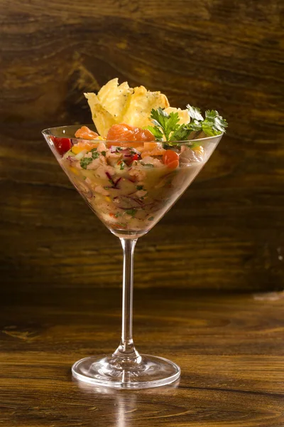 Mixed fish Ceviche with salmon, onion and pepper. Traditional pe — Stock Photo, Image