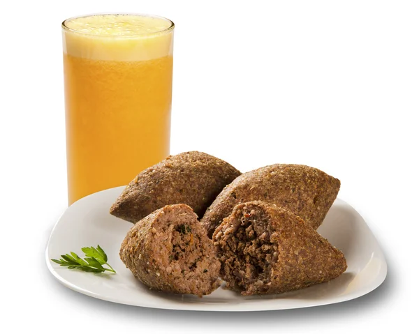 Kibe roast with orange juice. Brazilian snack. — Stock Photo, Image
