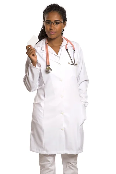 Black doctor writing on transparent glass — Stock Photo, Image