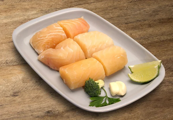 Raw fish on wooden background. — Stock Photo, Image