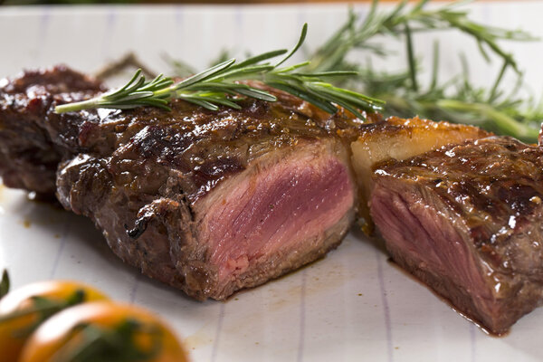 Steak roast on board with seasoning