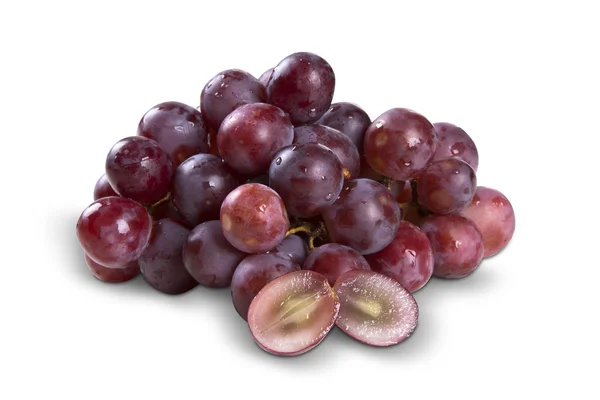 Quelques raisins rouges sur fond blanc — Photo