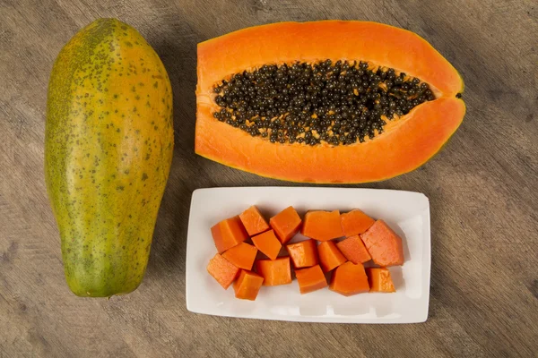Fresh cut juicy tropical papaya mamao fruit with seeds at Brazil — Stock Photo, Image