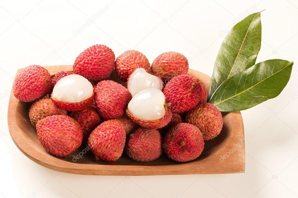 fresh lychees on white background.