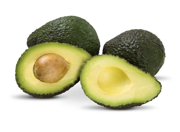 Sommige avocado's op een witte achtergrond. — Stockfoto