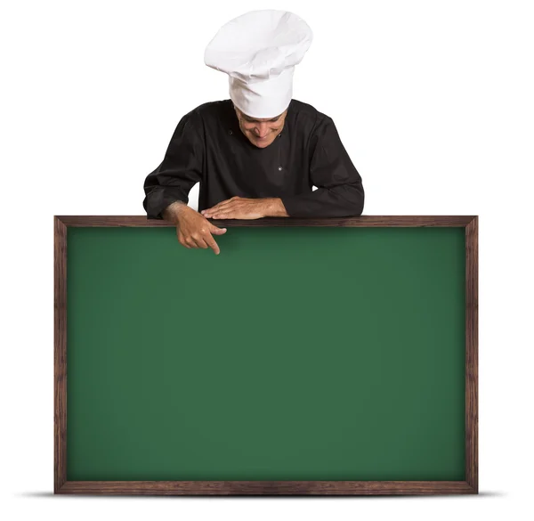 Egy profi szakács, egy tábla gazdaság portréja. — Stock Fotó