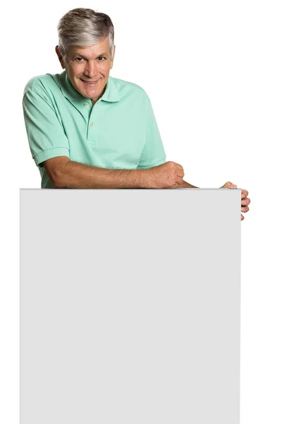 Portrait of a mature man holding a blank panel. — Stock Photo, Image