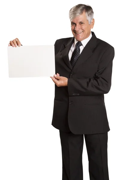 Portrait of happy smiling young business man showing blank signb — Stock Photo, Image