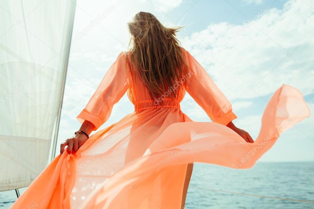 sexy woman in swimwear pareo yacht sea cruise vacation