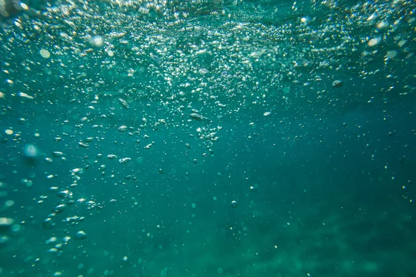Абстрактный подводный фон с боке — стоковое фото