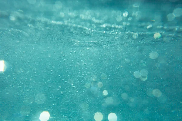 Streszczenie tło pod wodą z bokeh — Zdjęcie stockowe