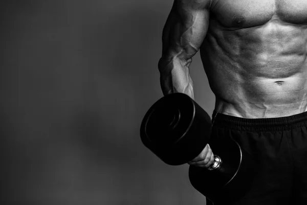 Muscular bodybuilder guy close up monochrome — Stock Photo, Image