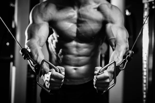 Bodybuilder guy in gym hands close up — Stock Photo, Image