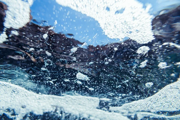 Abstracto bajo el agua burbujas de espuma de mar fondo — Foto de Stock