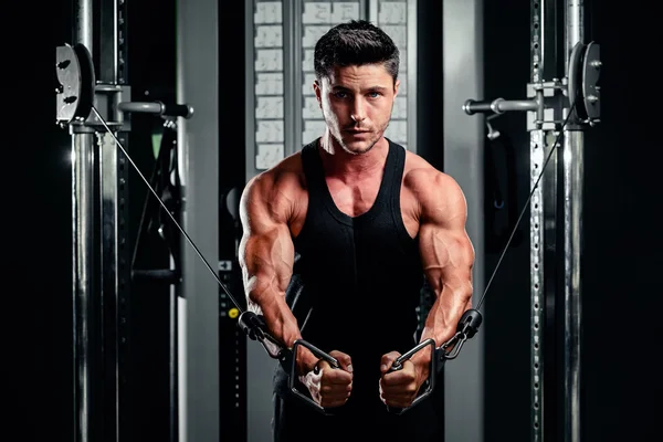 Handsome man work out in gym — Stock Photo, Image