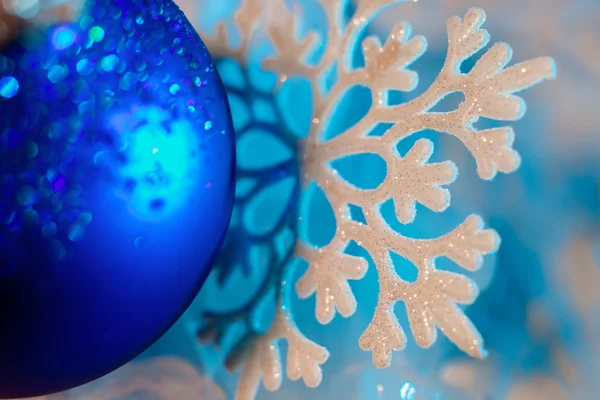 Schneeflocke blauer Makro-Hintergrund — Stockfoto