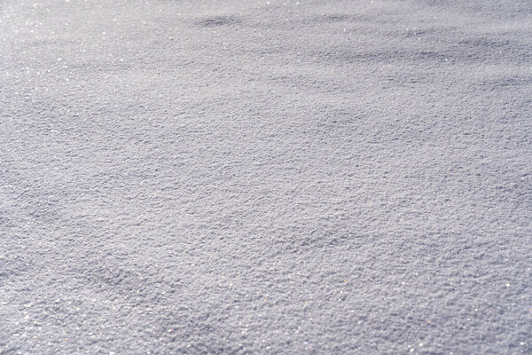 A clear patch of fresh, frozen and perfectly smooth snow