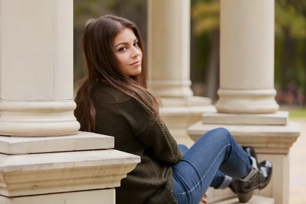 The beautiful girl on an arbour handrail — Stock Photo, Image