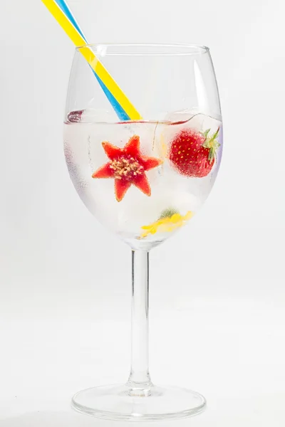 Fruits et fleurs congelés en verre — Photo