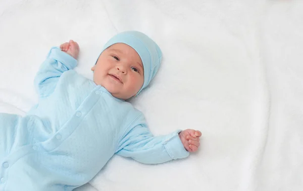 Funny baby on a blanket — Stock Photo, Image