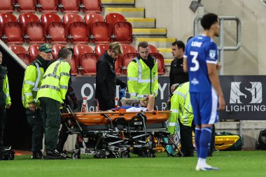 Tom Conlon of Oldham Athletic comes off on a stretcher after an injury during the The Vertu Trophy Northern Group E match Rotherham United vs Oldham Athletic at New York Stadium, Rotherham, United Kingdom, 7th October 2025 