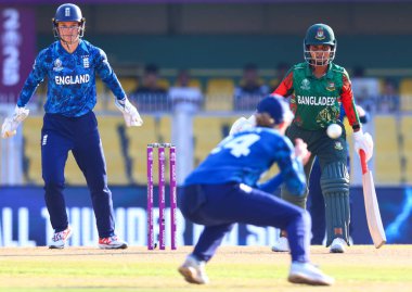 Charlie Dean of England taking a catch Nigar Sultana Joty (Captain) of Bangladesh during the ICC Women's World Cup match England Women vs Bangladesh Women at ACA Barsapara Cricket Stadium, Guwahati, Assam/ India, 7th October 2025