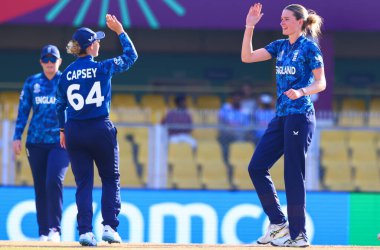 Sophia Dunkley of England taking a catch of Rubya Haider of Bangladesh ball by Lauren Bell of England during the ICC Women's World Cup match England Women vs Bangladesh Women at ACA Barsapara Cricket Stadium, Guwahati, Assam/ India, 7th October 2025