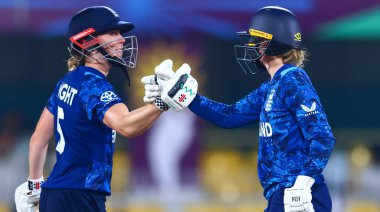 Heather Knight of England and Charlie Dean of England during the ICC Women's World Cup match England Women vs Bangladesh Women at ACA Barsapara Cricket Stadium, Guwahati, Assam/ India, 7th October 2025 