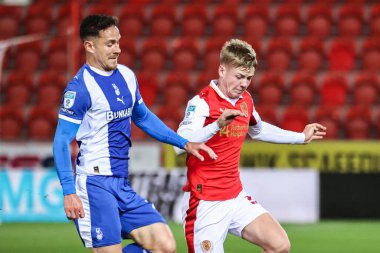 Kieron Morris of Oldham Athletic and Kane Richardson of Rotherham United battle for the ball during the The Vertu Trophy Northern Group E match Rotherham United vs Oldham Athletic at New York Stadium, Rotherham, United Kingdom, 7th October 2025 