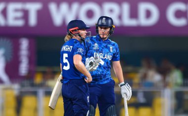 Heather Knight of England and Nat Sciver Brunt (Captain) of England during the ICC Women's World Cup match England Women vs Bangladesh Women at ACA Barsapara Cricket Stadium, Guwahati, Assam/ India, 7th October 2025 