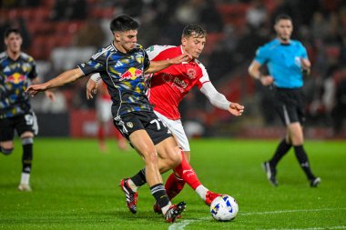 Will Firth of Leeds United  tackles Will Davies of Fleetwood Town during the The Vertu Trophy match Fleetwood Town vs Leeds United Academy at Highbury Stadium, Fleetwood, United Kingdom, 7th October 2025 