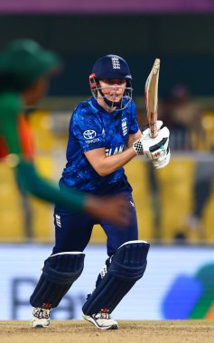 Heather Knight of England hits a four during the ICC Women's World Cup match England Women vs Bangladesh Women at ACA Barsapara Cricket Stadium, Guwahati, Assam/ India, 7th October 2025