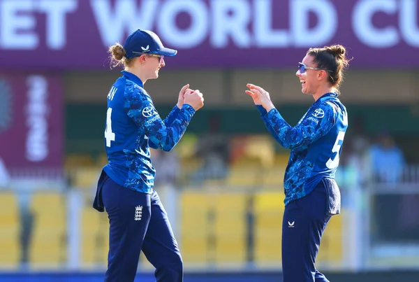 Charlie Dean of England taking a catch Nigar Sultana Joty (Captain) of Bangladesh during the ICC Women's World Cup match England Women vs Bangladesh Women at ACA Barsapara Cricket Stadium, Guwahati, Assam/ India, 7th October 2025