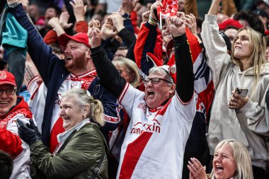 Hull KR fans celebrate a try from Mikey Lewis of Hull KR to make it 4-0 during the 2025 Betfred Super League Grand Final Hull KR v Wigan Warriors at Old Trafford, Manchester, United Kingdom, 11th October 2025 
