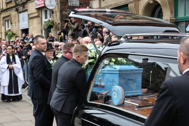 Richard John Hatton MBEs coffin is placed in the hearse by family members after his funeral service has been conducted during Ricky Hatton' Funeral at Manchester Cathedral, Manchester, United Kingdom, 10th October 2025 
