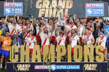 Elliot Minchella of Hull KR and his team mates and staff lift the Grand Final Trophy during the 2025 Betfred Super League Grand Final Hull KR v Wigan Warriors at Old Trafford, Manchester, United Kingdom, 11th October 2025 