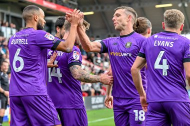 Warren Burrell of Harrogate Town  celebrates opening the scoring with team mates for Harrogate Town 0-1 during the Sky Bet League 2 match Fleetwood Town vs Harrogate Town at Highbury Stadium, Fleetwood, United Kingdom, 11th October 2025 
