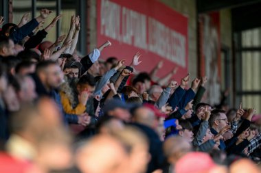 Fleetwood Town supporters  celebrate the 3-2 during the Sky Bet League 2 match Fleetwood Town vs Harrogate Town at Highbury Stadium, Fleetwood, United Kingdom, 11th October 2025 