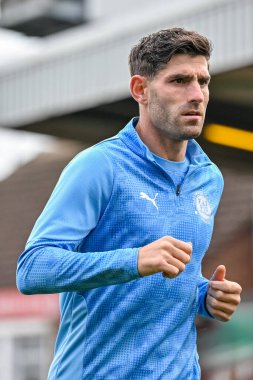 Ched Evans of Fleetwood Town warms up during the Sky Bet League 2 match Fleetwood Town vs Harrogate Town at Highbury Stadium, Fleetwood, United Kingdom, 11th October 2025