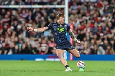 Adam Keighran of Wigan Warriors scores a penalty making it 10-2 during the 2025 Betfred Super League Grand Final Hull KR v Wigan Warriors at Old Trafford, Manchester, United Kingdom, 11th October 2025 