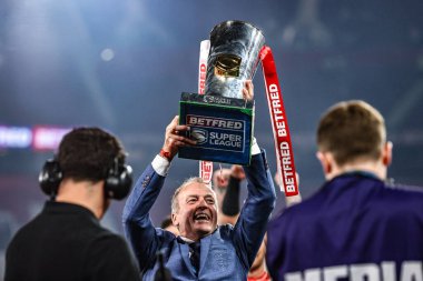 Hull KR owner Neil Hudgell lifts the Grand Final trophy with the fans during the 2025 Betfred Super League Grand Final Hull KR v Wigan Warriors at Old Trafford, Manchester, United Kingdom, 11th October 2025 